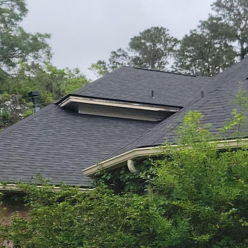 Owens Corning shingle roof with gutters and trees Owens Corning shingle roof with gutters and trees