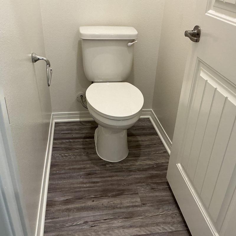 Toilet reinstalled with new wax ring and closet bolts Toilet reinstalled with new wax ring and closet bolts