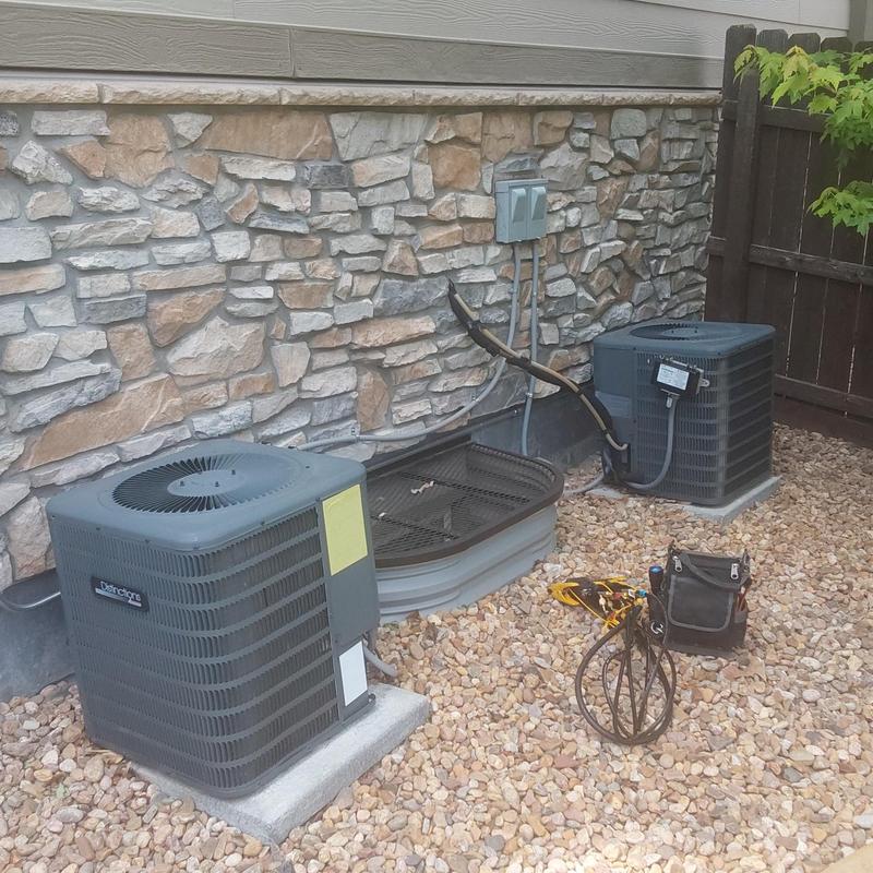 Amana GSX13 air conditioners serviced outdoors