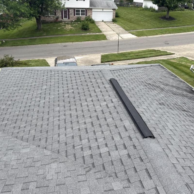Asphalt shingle roof with ridge vent installation Asphalt shingle roof with ridge vent installation