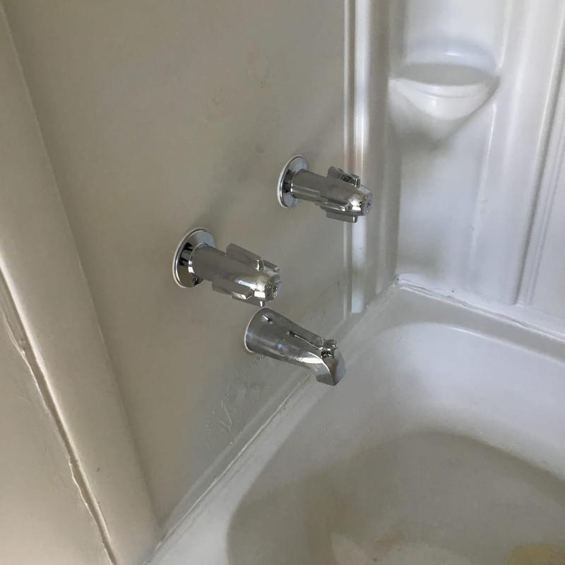 Two-handle tub shower valve and spout in mobile home Two-handle tub shower valve and spout in mobile home