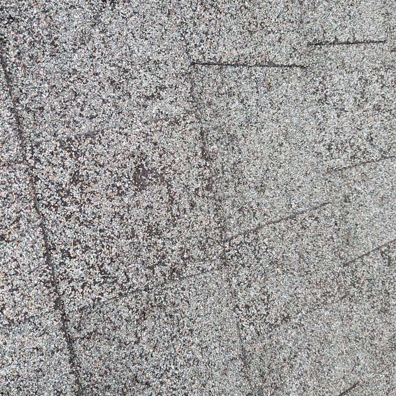 Asphalt shingle roof surface inspection after heavy rain Asphalt shingle roof surface inspection after heavy rain