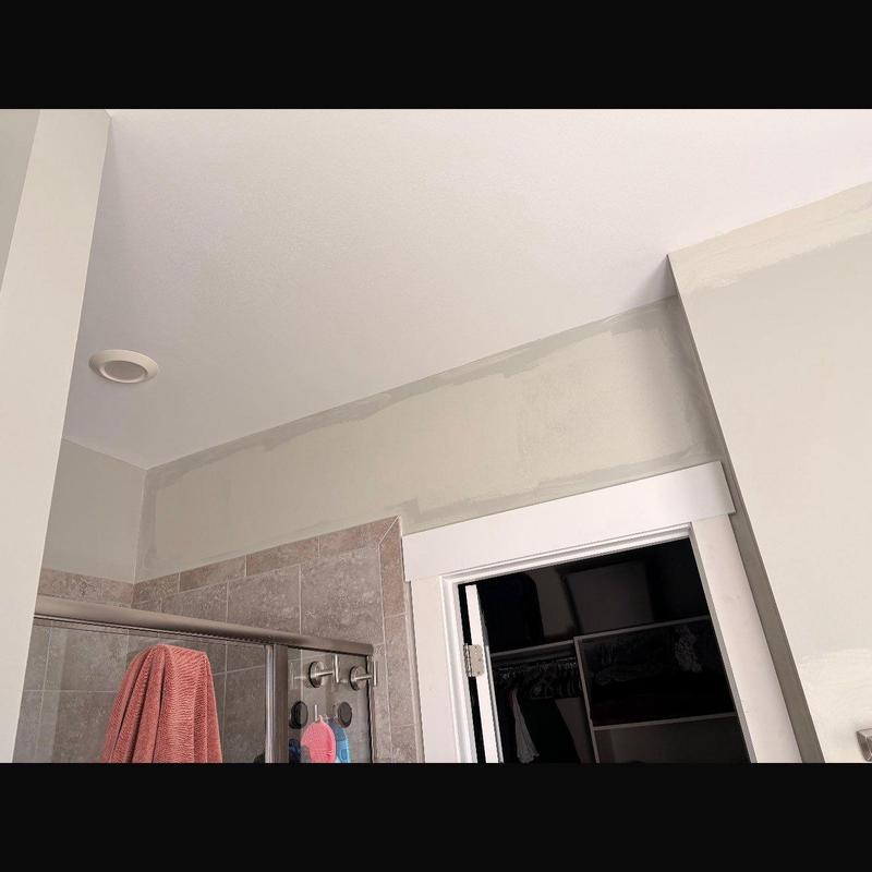 Bathroom drywall patch and paint near shower door