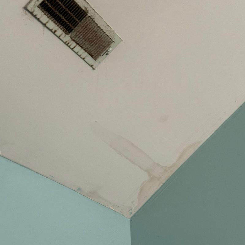 Ceiling water damage and ventilation vent inspection
