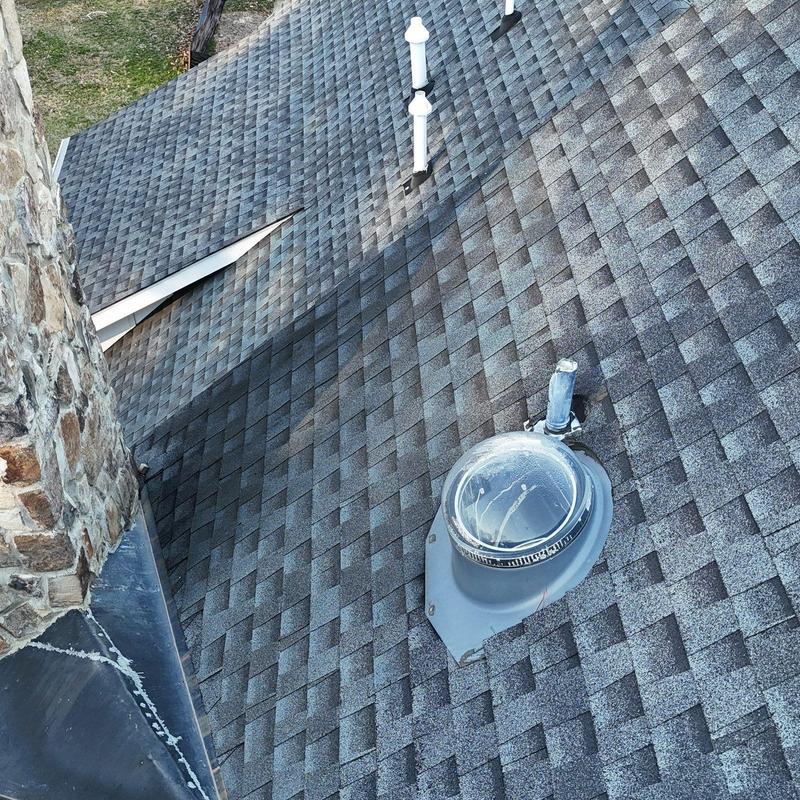Roof vent installation on asphalt shingle roof