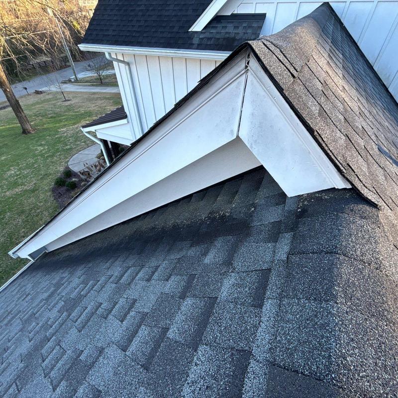 Asphalt shingle roof with hail damage inspection