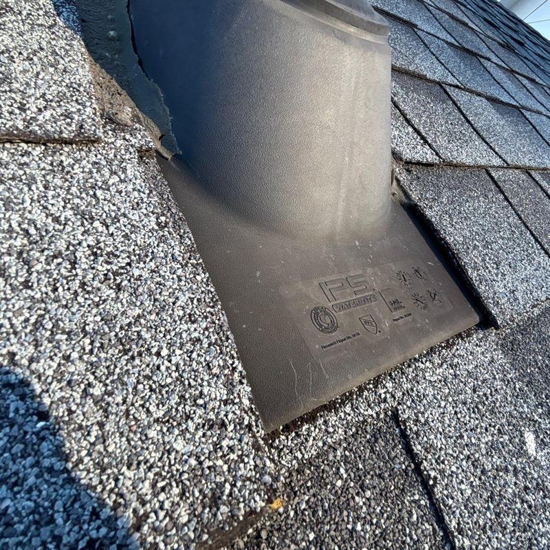Roof flashing installation on asphalt shingle roof