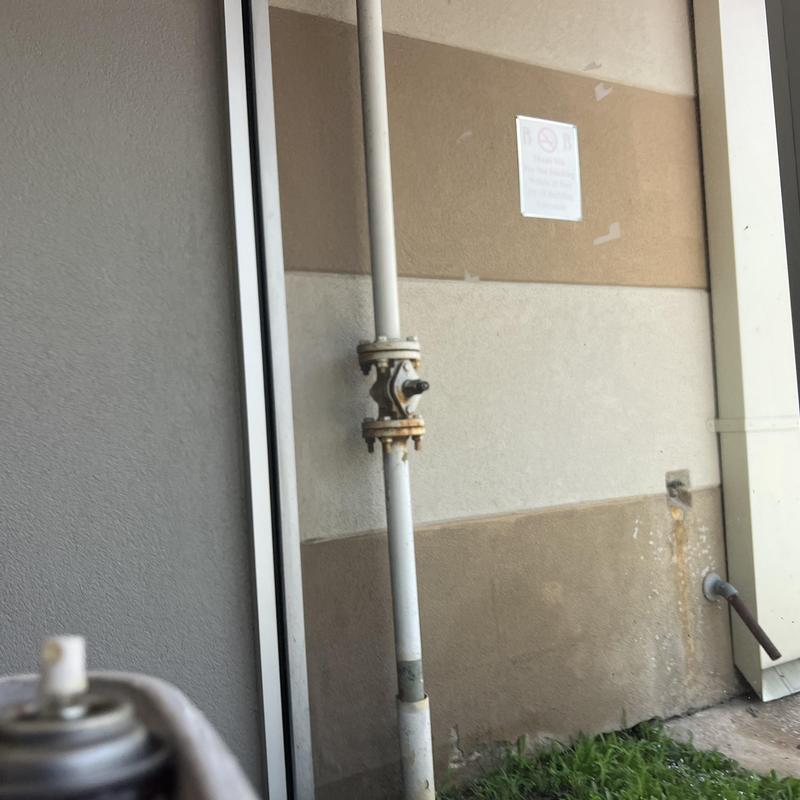 Backflow preventer valve on outdoor pipe system