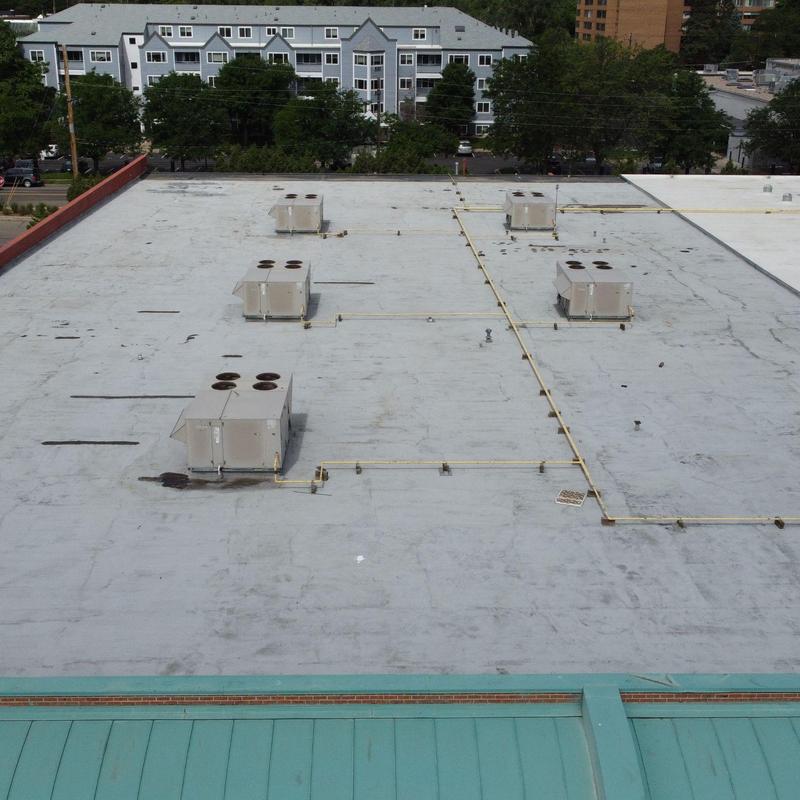 Torchdown modified roofing system with rooftop units Torchdown modified roofing system with rooftop units