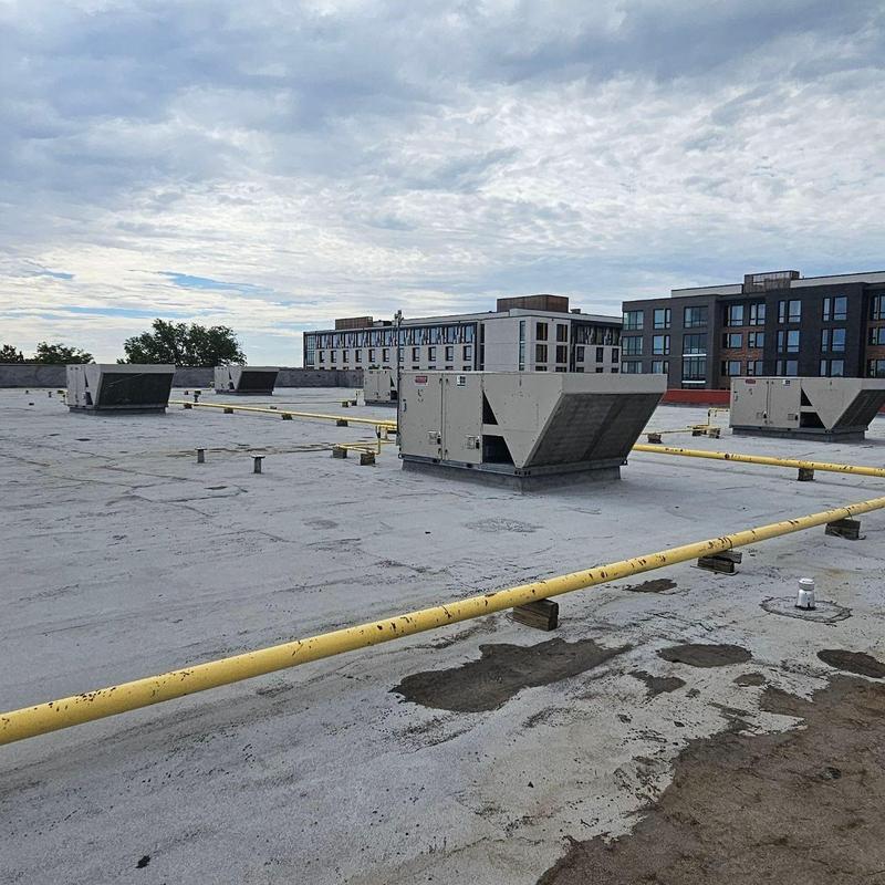 Torchdown modified flat roofing with HVAC units Torchdown modified flat roofing with HVAC units