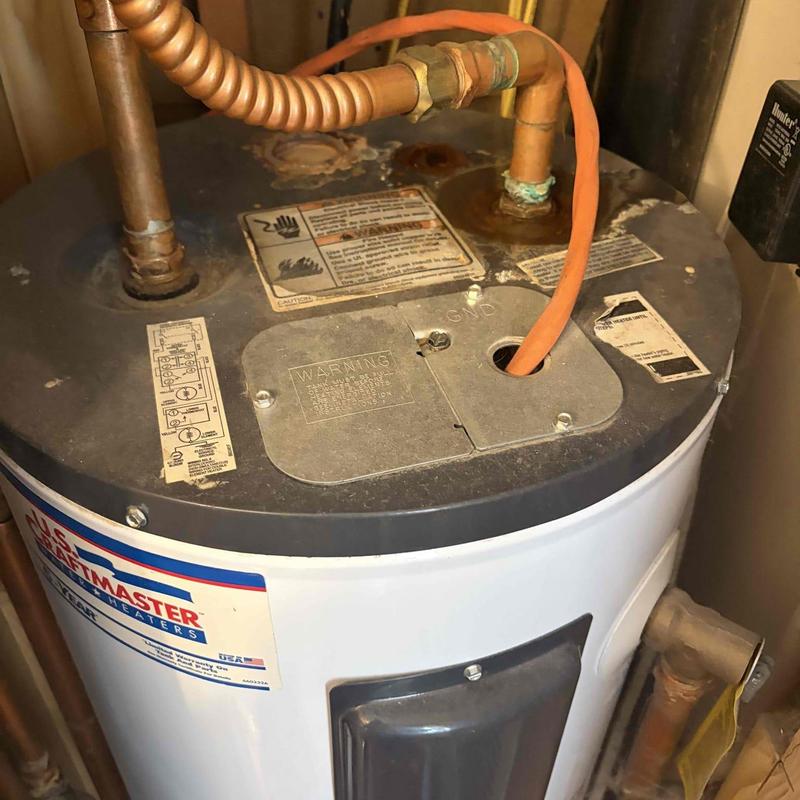 Water heater with corroded pipes in tight closet Water heater with corroded pipes in tight closet