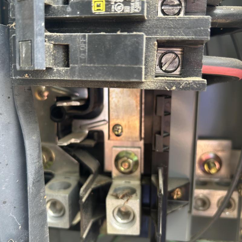 Main electrical service panel damaged wiring close-up Main electrical service panel damaged wiring close-up
