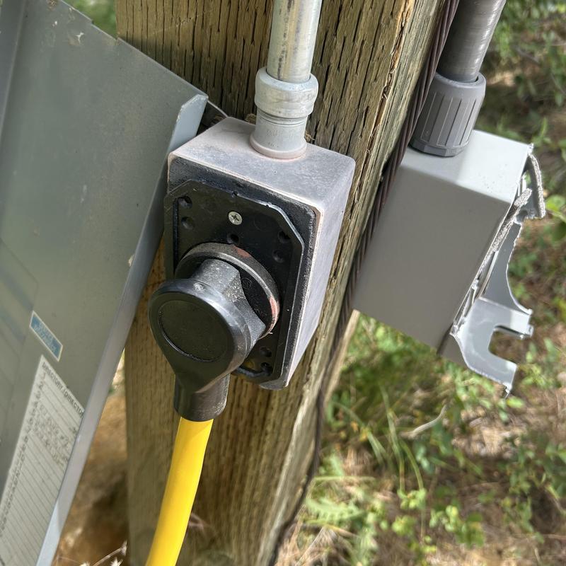Generator power inlet with yellow cable connection Generator power inlet with yellow cable connection