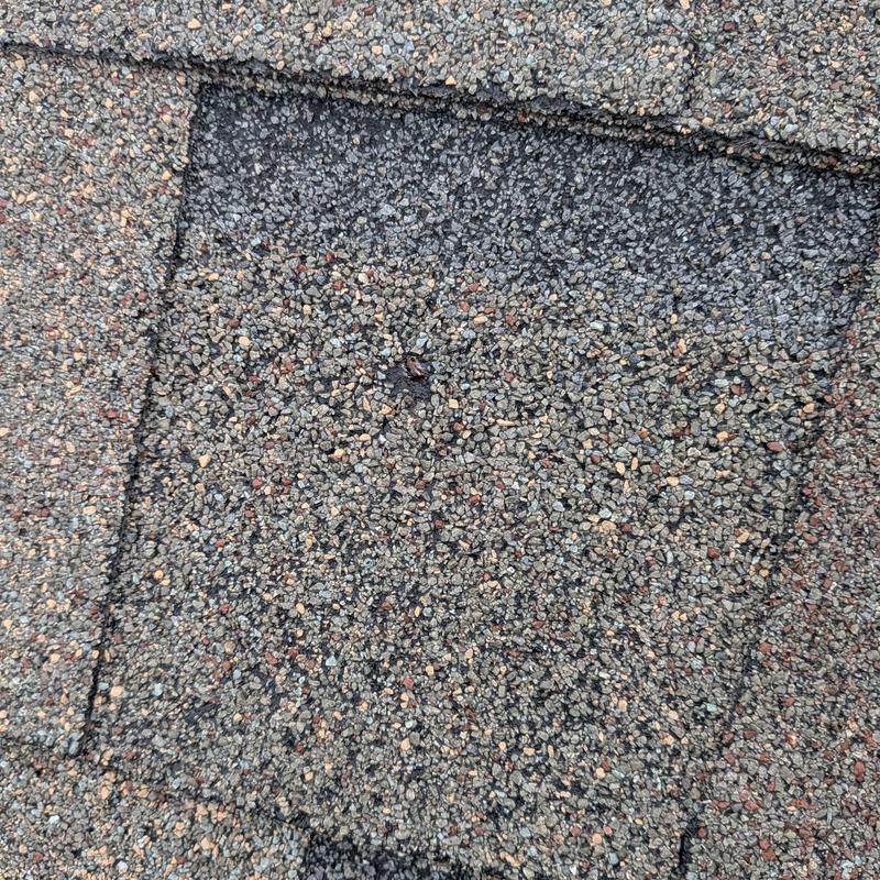 Asphalt roofing shingle patch with nail securement Asphalt roofing shingle patch with nail securement