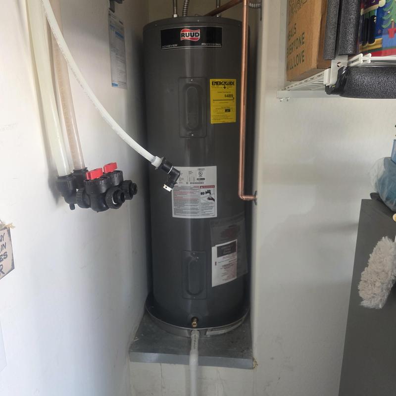 Electric water heater with copper piping installation Electric water heater with copper piping installation
