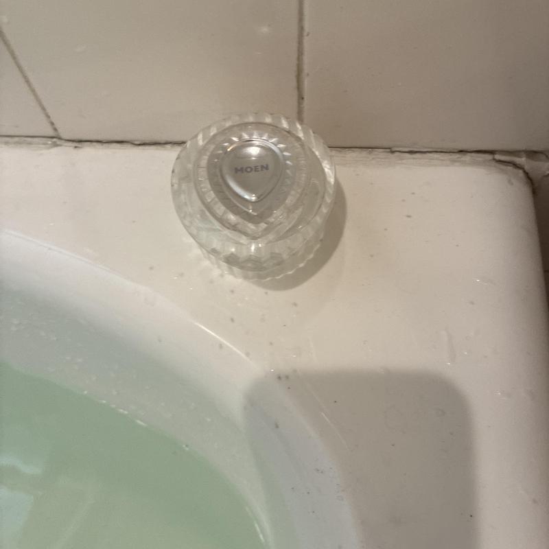 Moen shower faucet handle on bathtub ledge