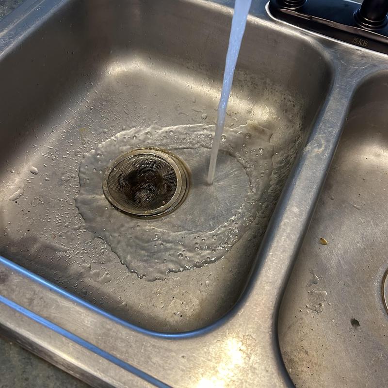 Kitchen sink faucet running for function test Kitchen sink faucet running for function test