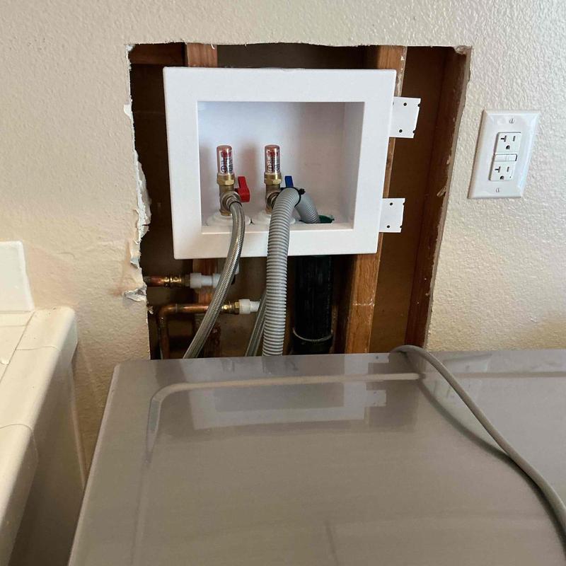Washing machine valves with hammer arrestors installed