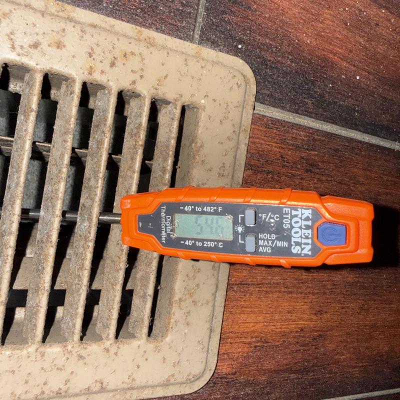 Floor vent air temperature check with digital thermometer Floor vent air temperature check with digital thermometer