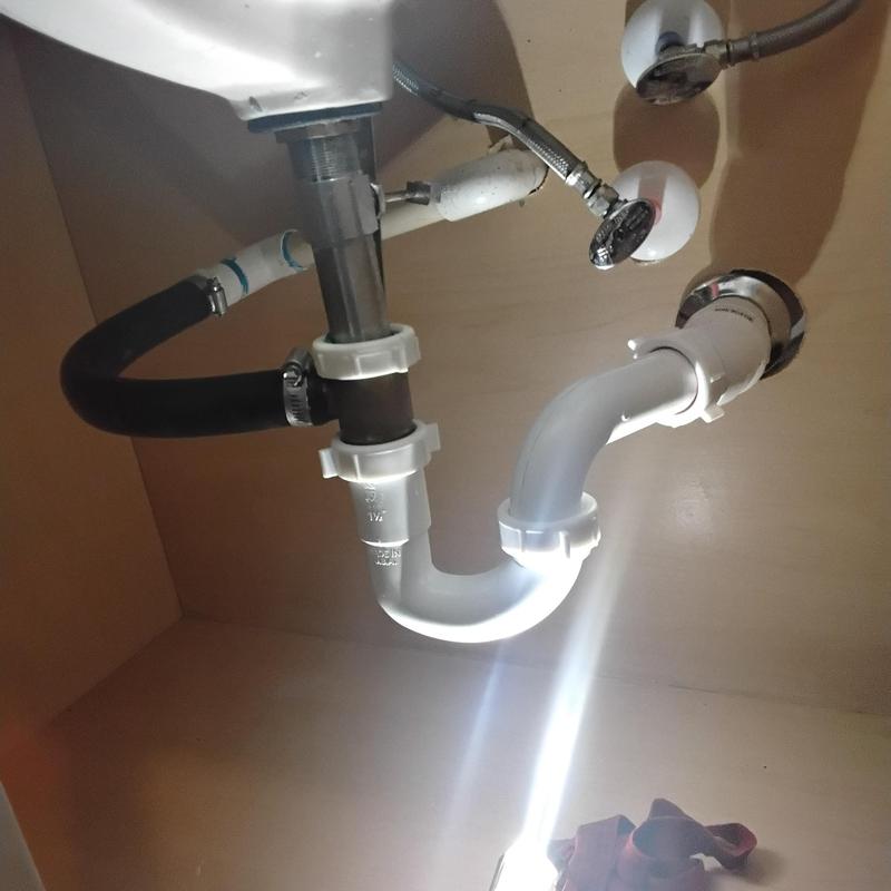 Lavatory sink drain pipes with AC drain line connection