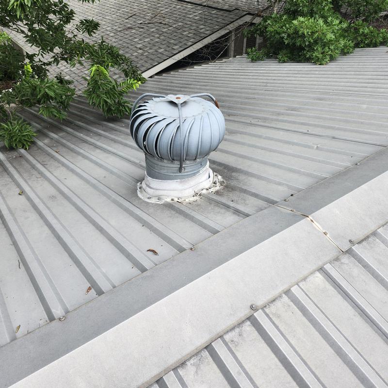 Whirlybird roof vent on metal panel roof Whirlybird roof vent on metal panel roof
