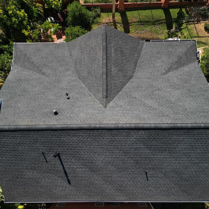 Architectural shingle roof with continuous ridge venting Architectural shingle roof with continuous ridge venting