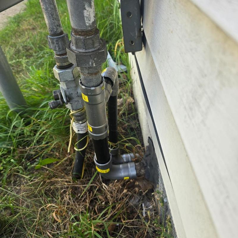 Gas valve replacements and leak repair outside house