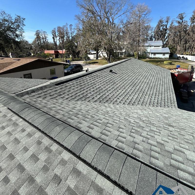 Architectural shingle roof with ridge vent installation Architectural shingle roof with ridge vent installation