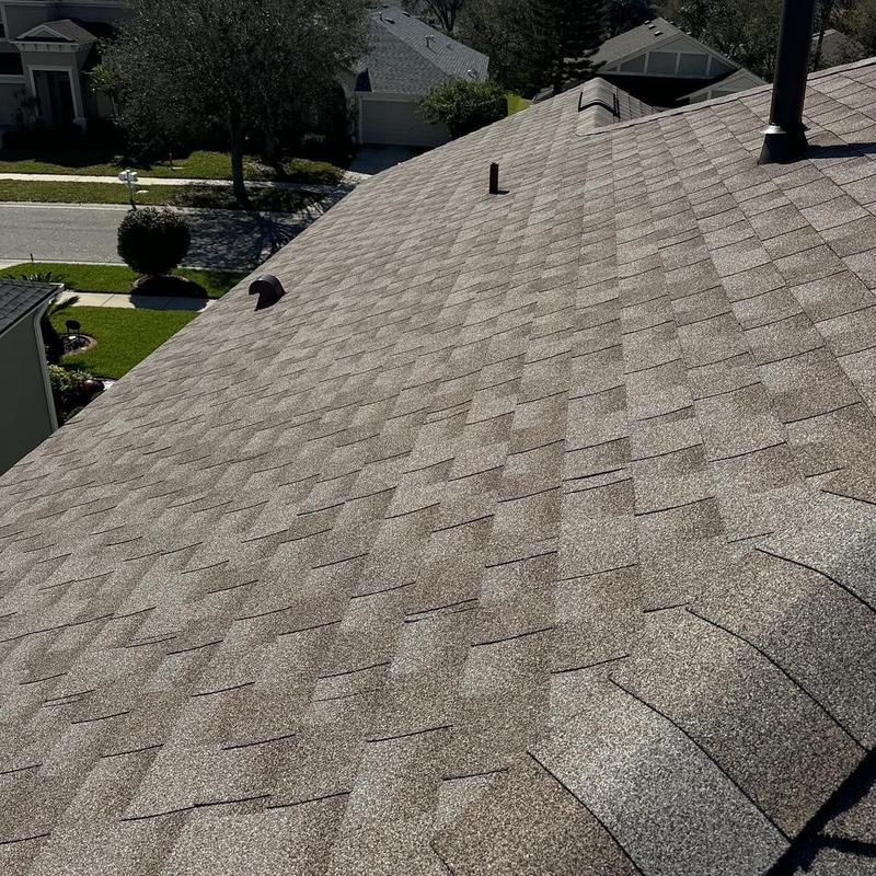 Architectural shingle roof with ventilation pipes Architectural shingle roof with ventilation pipes