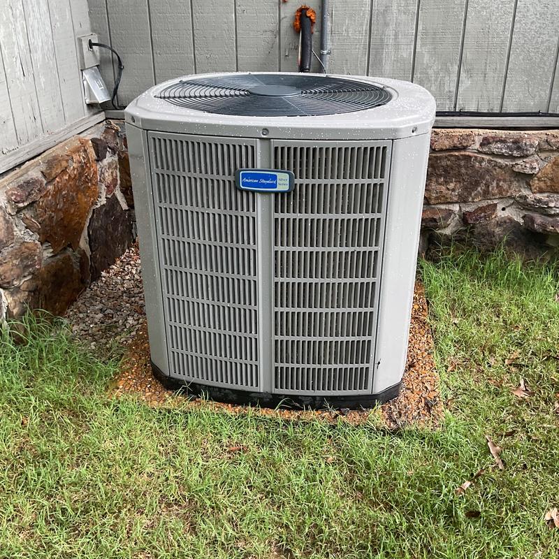 Outdoor air conditioner condenser unit with damaged panels Outdoor air conditioner condenser unit with damaged panels