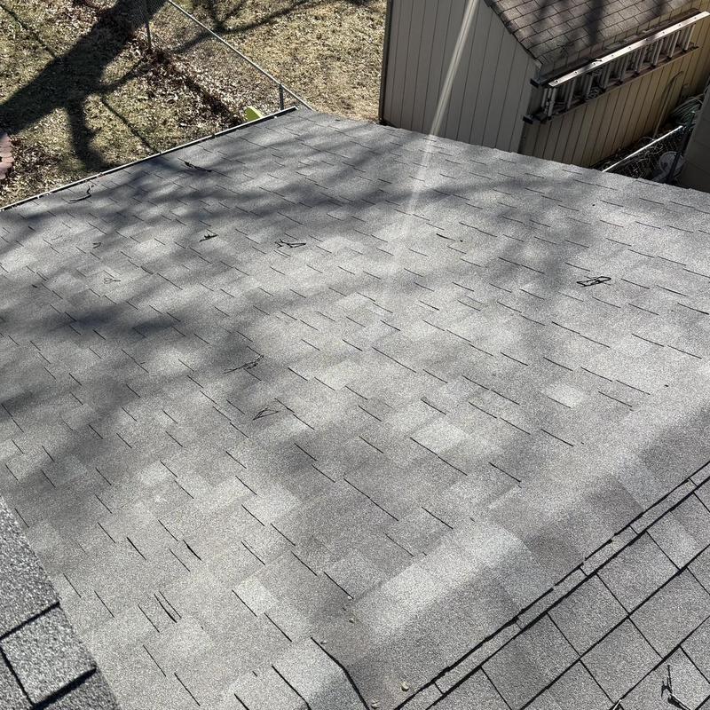 Asphalt shingle roof with repaired seams in Lincoln, NE