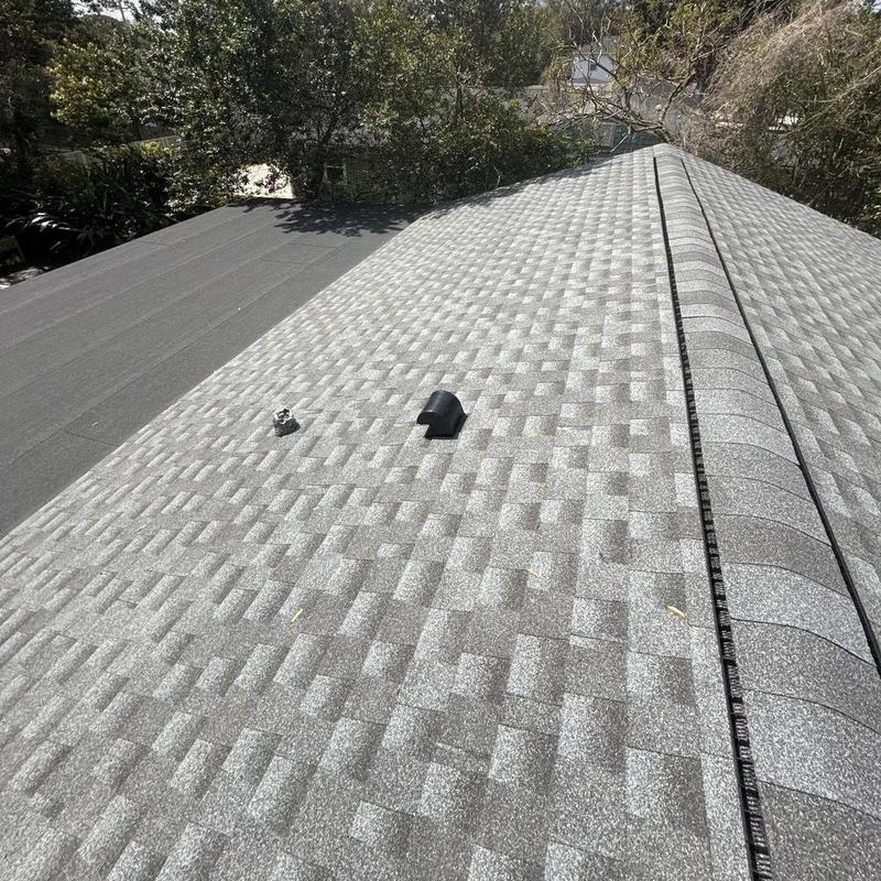 Architectural shingle roof with modified bitumen section Architectural shingle roof with modified bitumen section