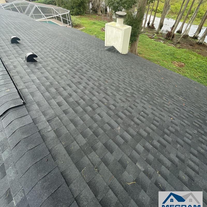 Architectural shingle roof with vents and chimney Architectural shingle roof with vents and chimney