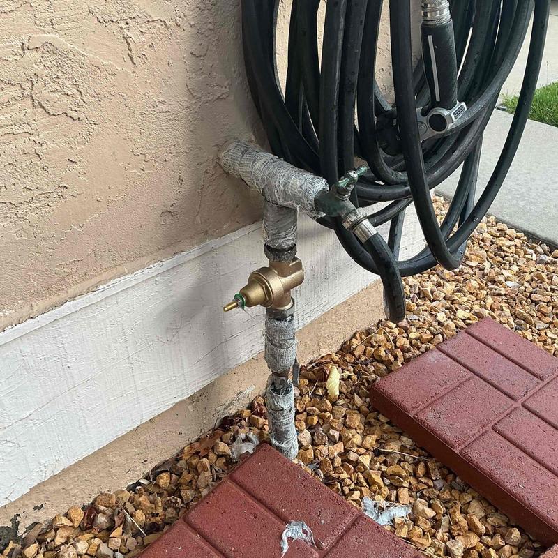 Pressure regulator valve on outdoor water main rise Pressure regulator valve on outdoor water main rise