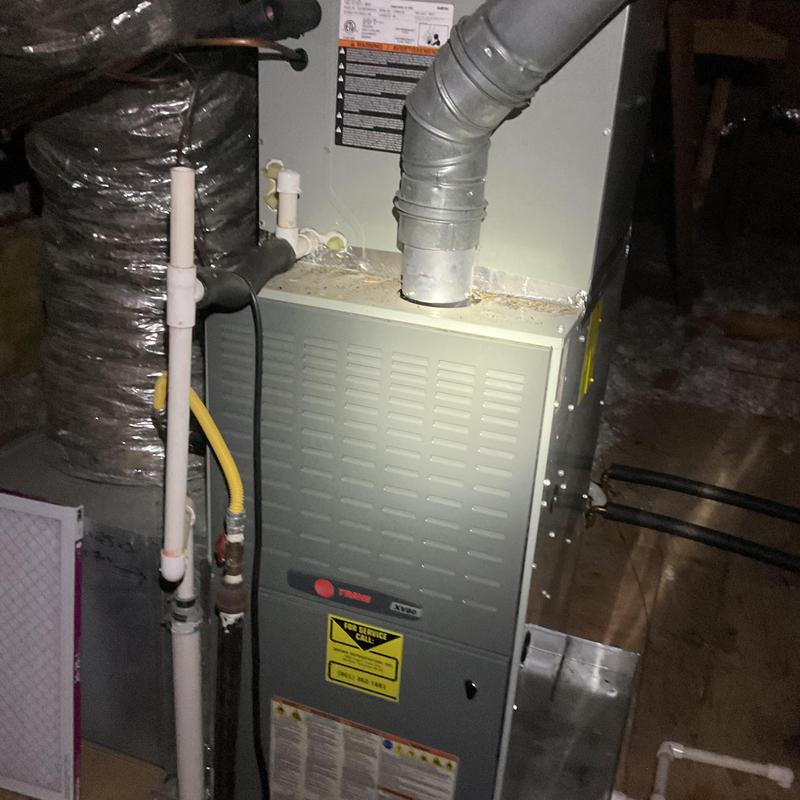 HVAC furnace unit inspection and maintenance in attic HVAC furnace unit inspection and maintenance in attic