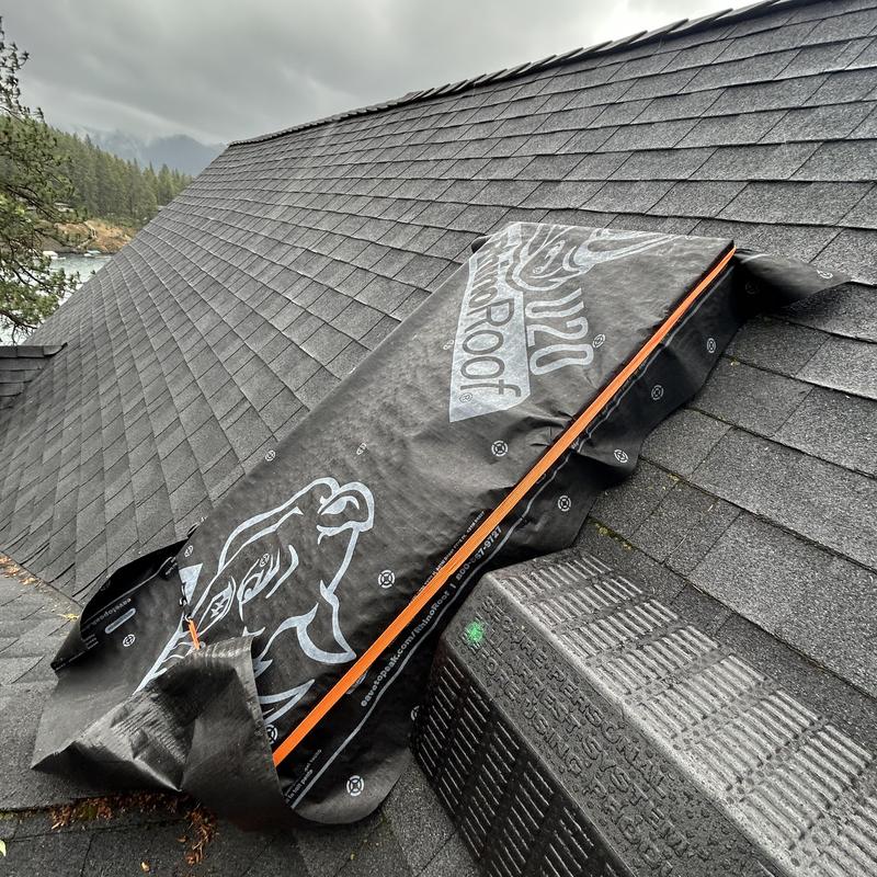Skylight waterproofing underlayment on asphalt roof