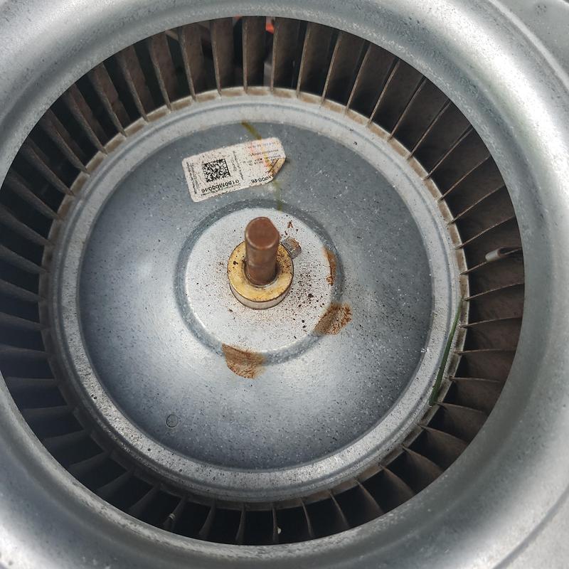 Blower wheel with motor shaft and rust marks