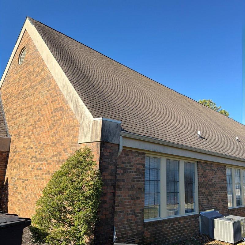 Asphalt shingle roof with hail damage inspection