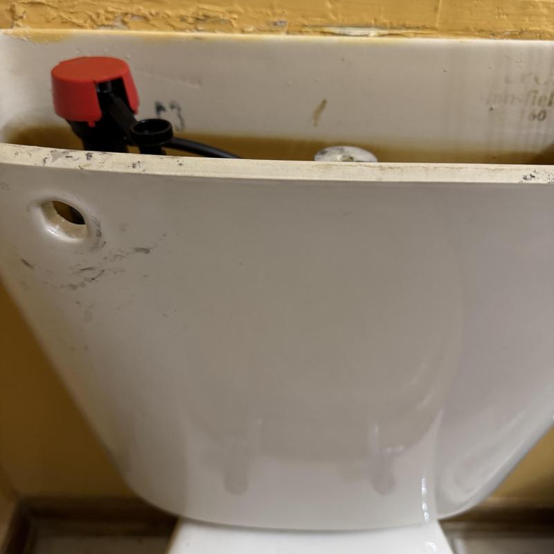 Mansfield toilet tank with replaced valve components Mansfield toilet tank with replaced valve components
