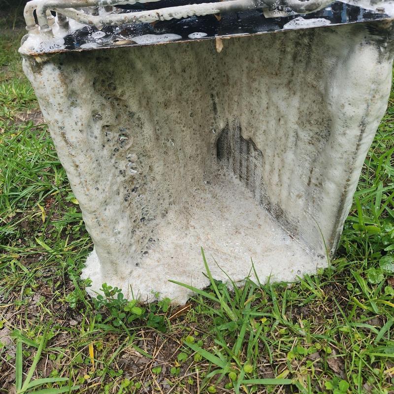 Evaporator coil with foam cleaner during maintenance