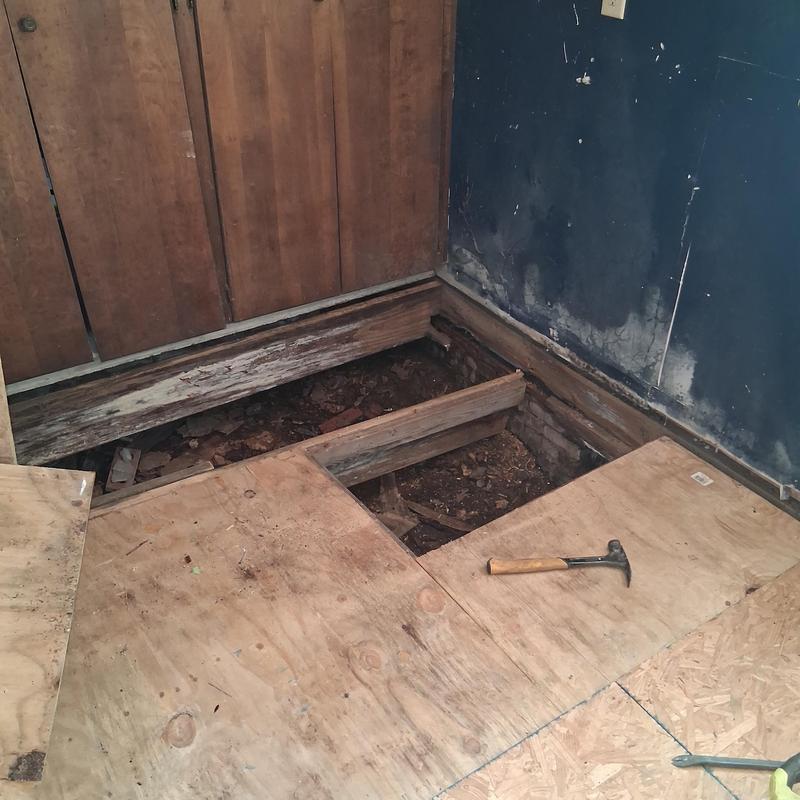 Rotten wooden joist replacement with new plywood subfloor