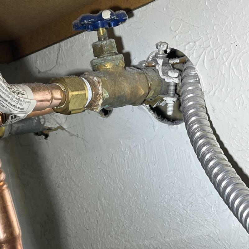 Galvanized pipe and valve with corrosion and leaks Galvanized pipe and valve with corrosion and leaks