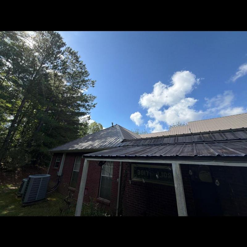 Metal roof screws backing out causing leaks