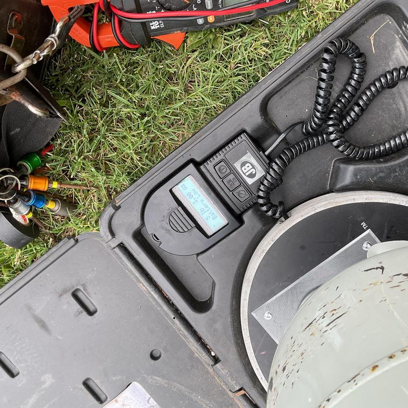 Freon gauge and HVAC manifold on grass case Freon gauge and HVAC manifold on grass case
