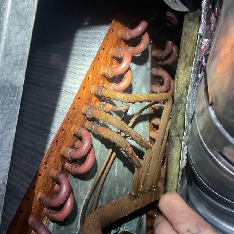 Evaporator coil and copper tubing with condensation droplets Evaporator coil and copper tubing with condensation droplets