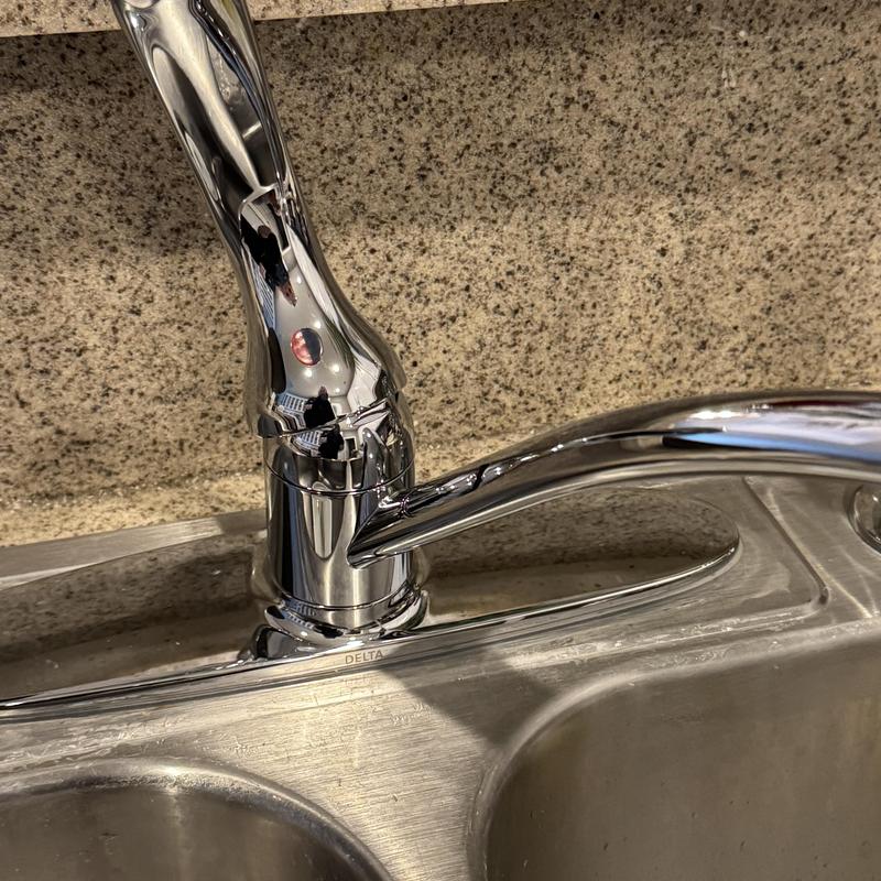 Delta kitchen sink faucet on stainless steel sink Delta kitchen sink faucet on stainless steel sink