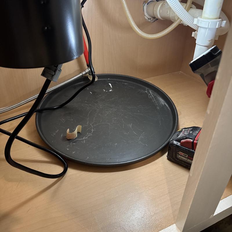 Kitchen sink water leak drip tray under plumbing Kitchen sink water leak drip tray under plumbing