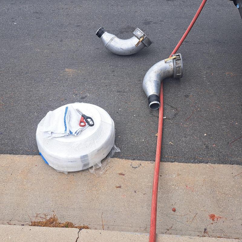 Clay lateral pipe and Permaliner coil on driveway