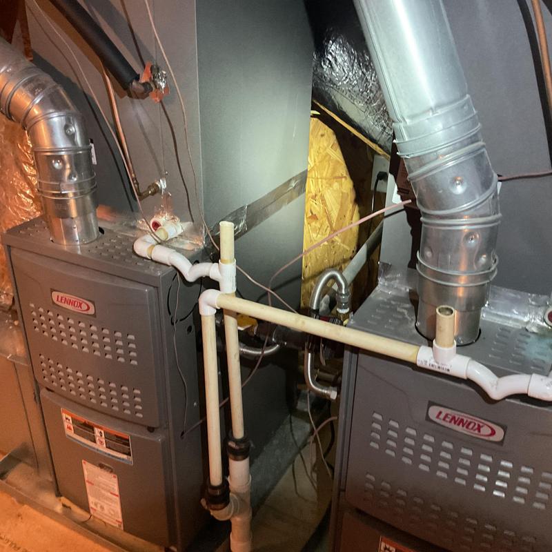 Furnace units with vent and PVC drainage pipes Furnace units with vent and PVC drainage pipes