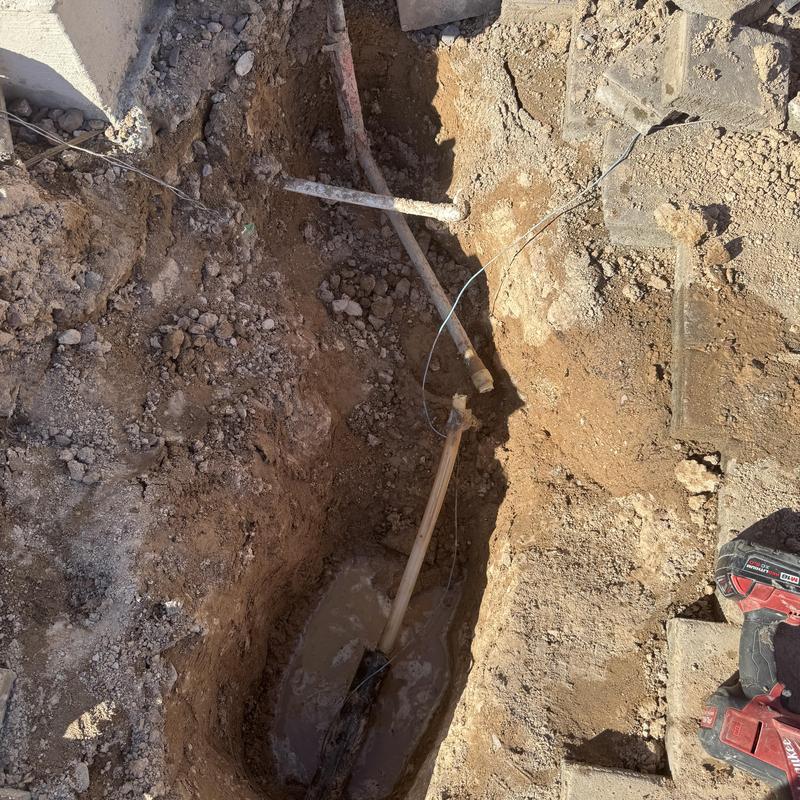 Watermain line excavation for pinhole leak repair Watermain line excavation for pinhole leak repair